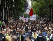 تظاهرات عارمة في باريس واشتباكات بسبب “التصريح الصحي”