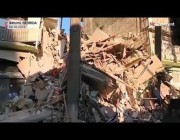 فرق الإنقاذ الجورجية تبحث عن ناجين تحت أنقاض بناية منهارة