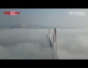 جسر لعبور القطارات يسبح وسط الغيوم في مقاطعة جنوب غرب الصين