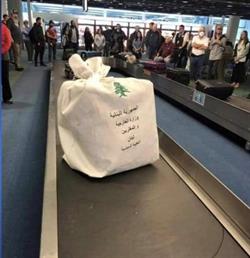 صندوق لجهة حكومية لبنانية في سير الأمتعة بمطار أمريكي يثير الجدل.. والخارجية تعلق